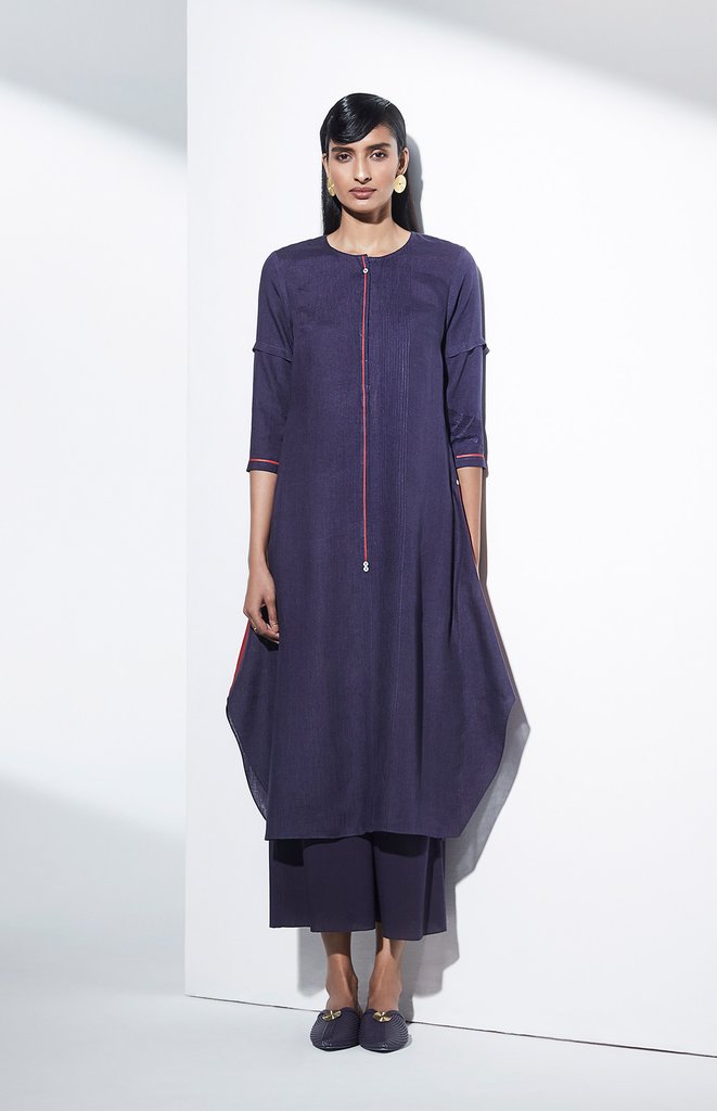 Learn How To Style Your Tunic Tops This Season