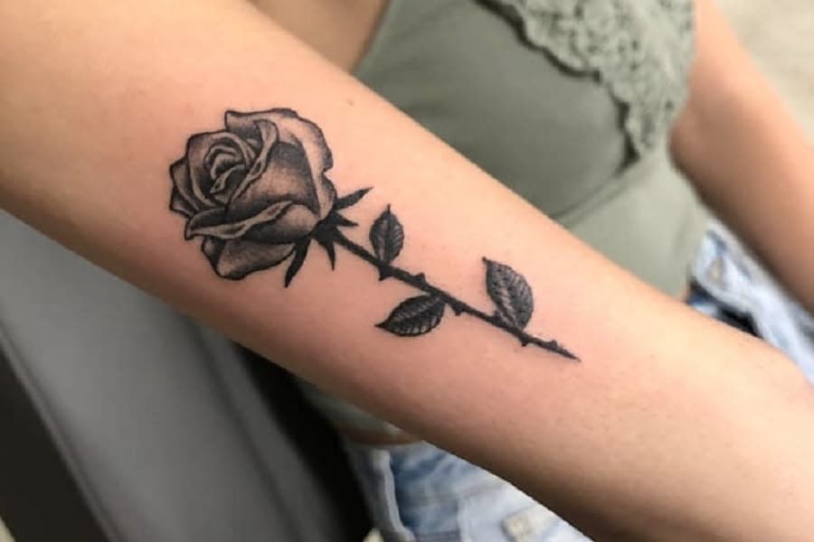 The Colors and Meanings of Rose Tattoo Designs